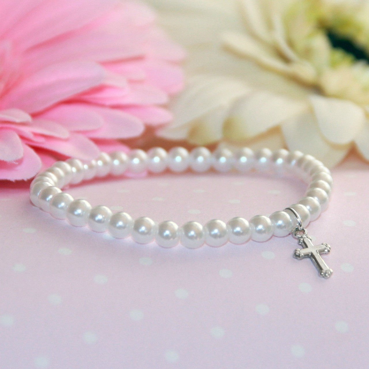 Collectables America 5" Stretch Pearl Bracelet with Silver Cross