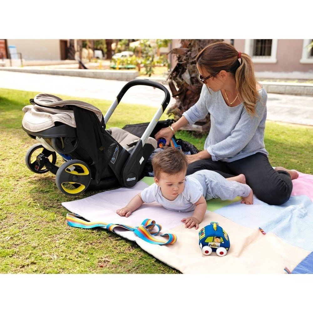 Doona Nitro Black Infant Car Seat/Stroller with Base