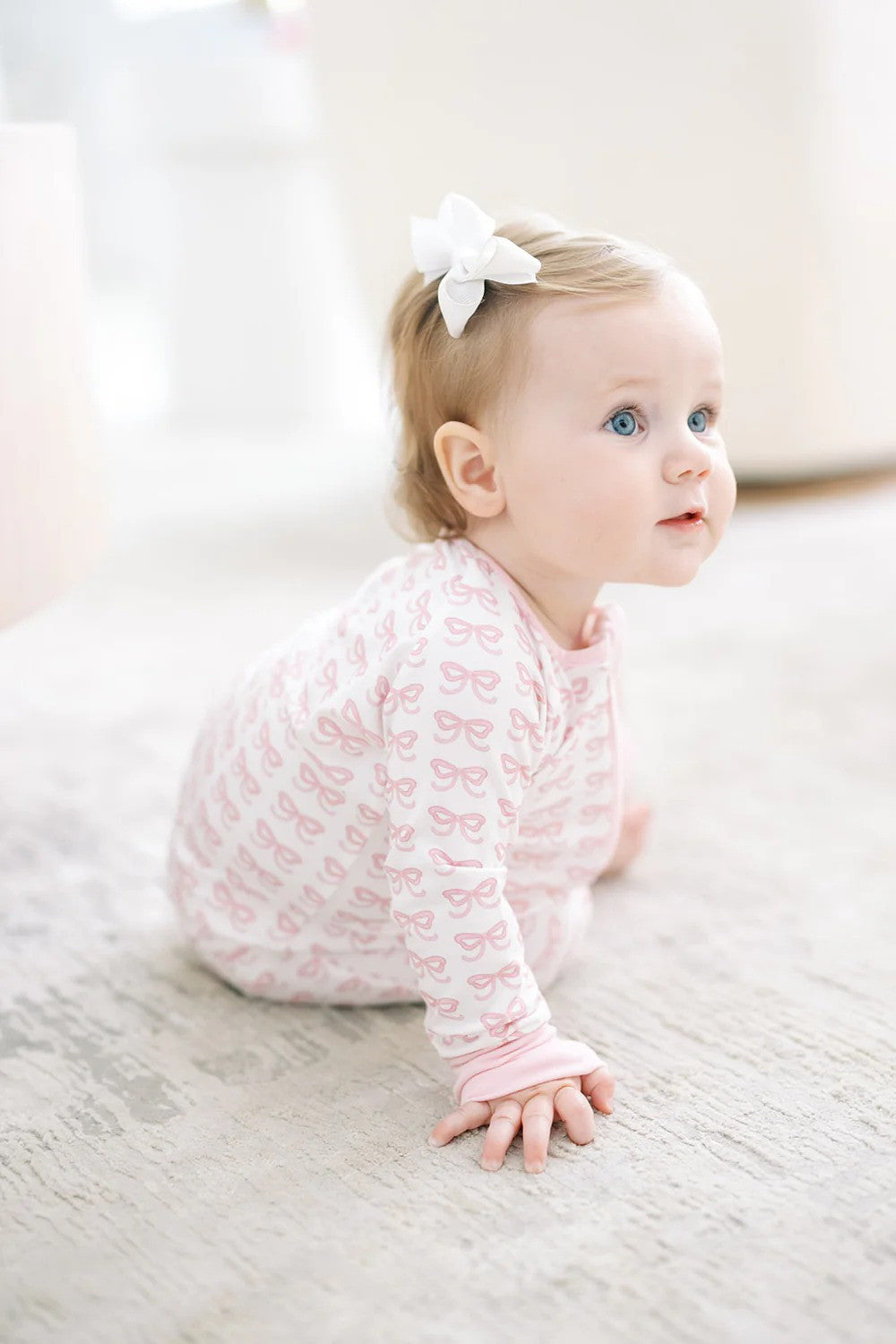 The Uptown Baby Pink Bows Long Sleeve Romper