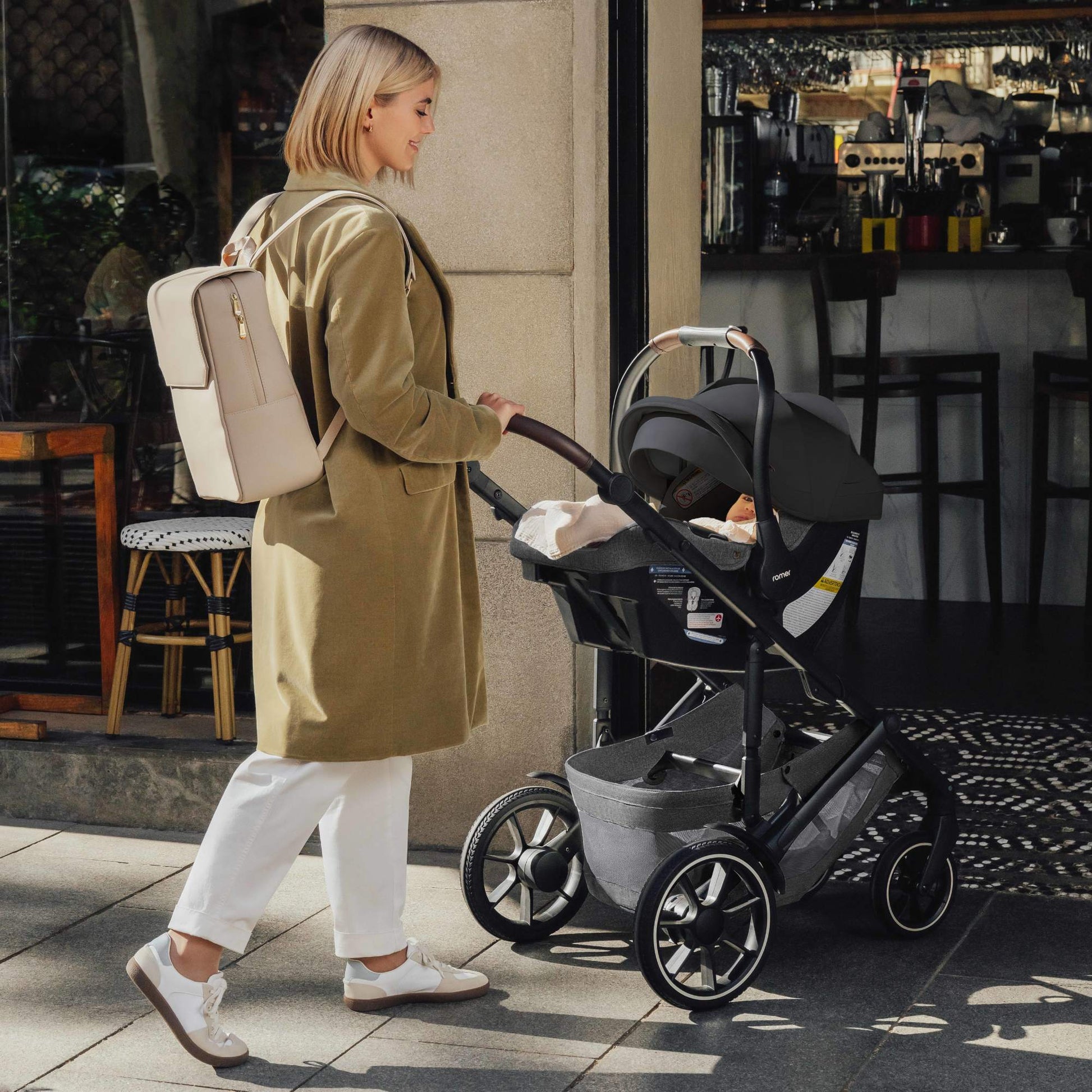 Romer Juni Infant Car Seat + Tura Stroller Travel System
