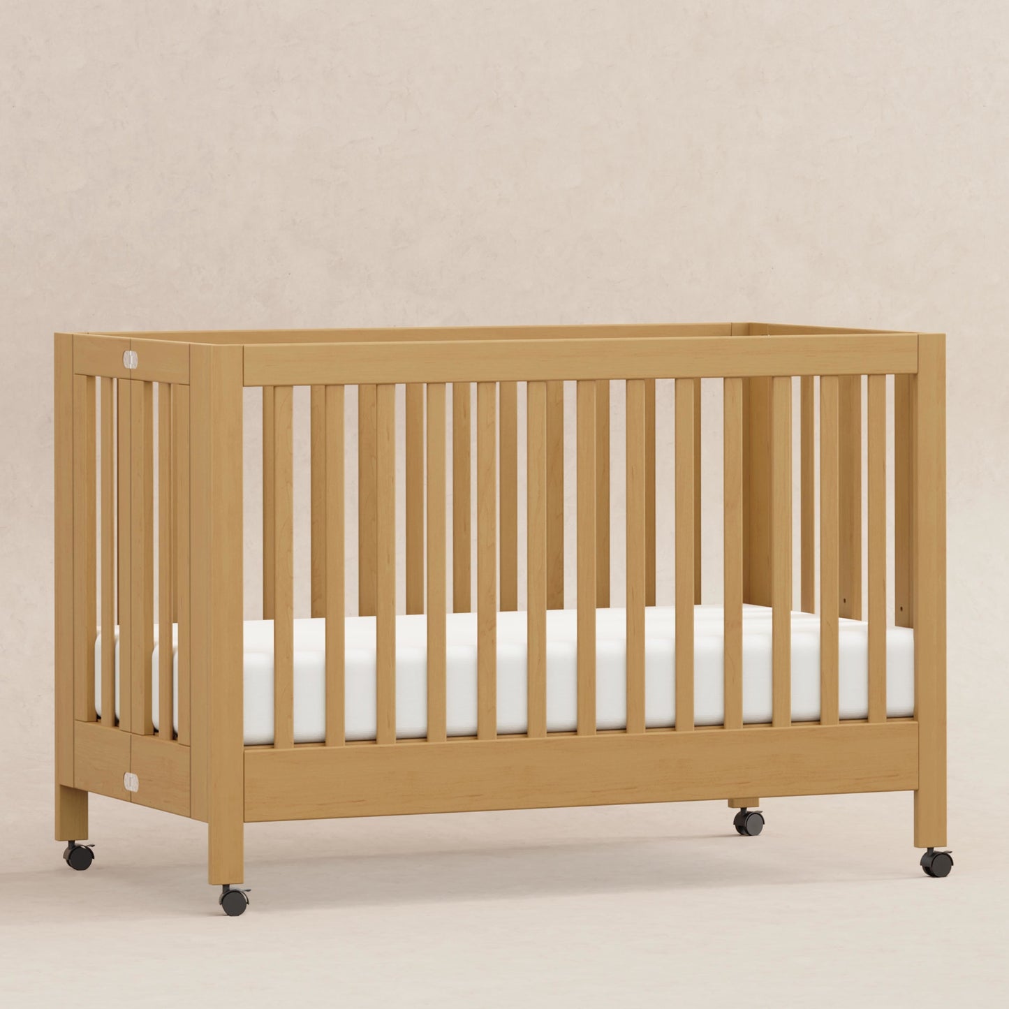 Babyletto Cribs White Babyletto Maki Portable Folding Crib with Toddler Bed Conversion Kit