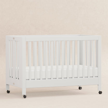 Babyletto Cribs White Babyletto Maki Portable Folding Crib with Toddler Bed Conversion Kit
