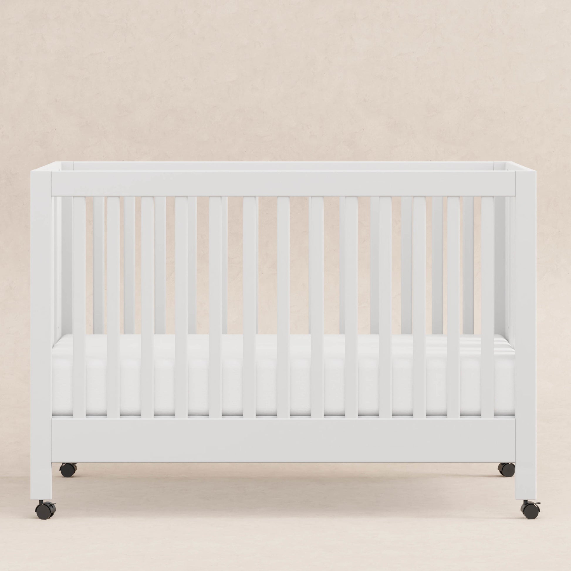 Babyletto Cribs White Babyletto Maki Portable Folding Crib with Toddler Bed Conversion Kit