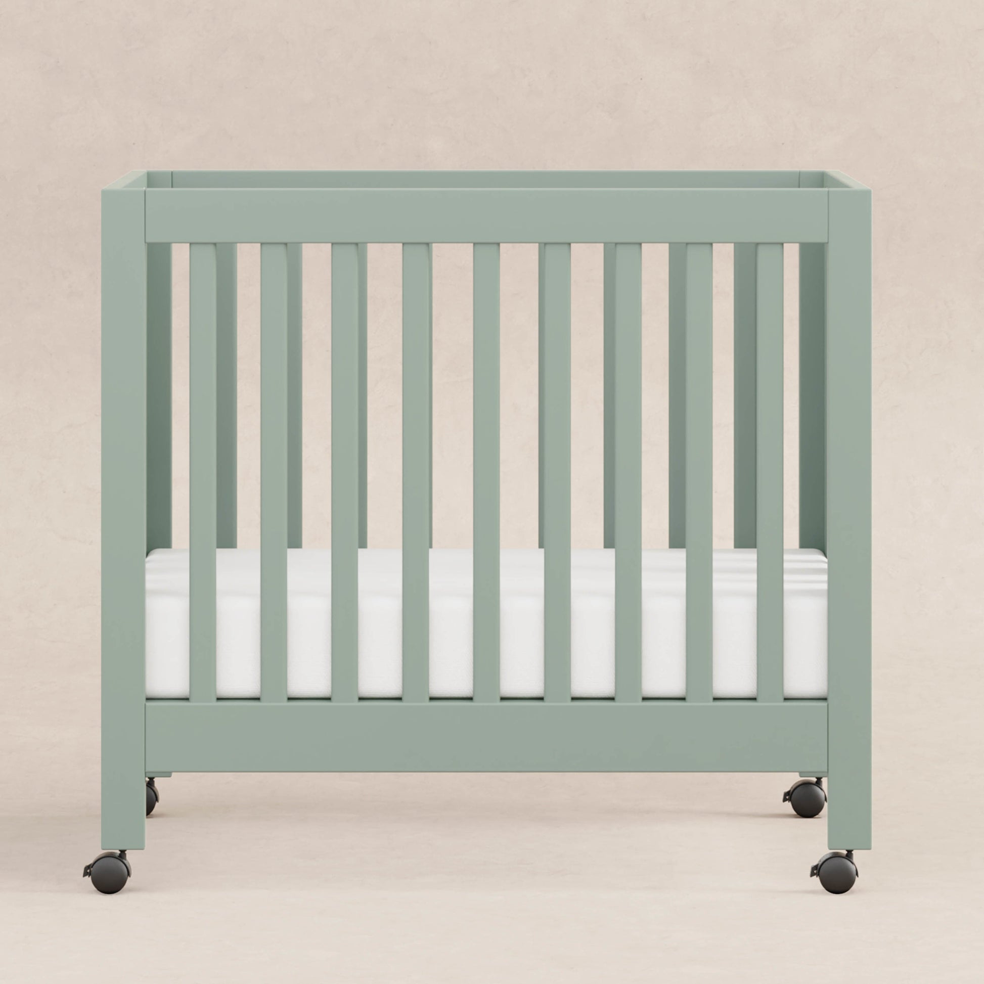 Babyletto Cribs Light Sage Babyletto Origami Mini Crib