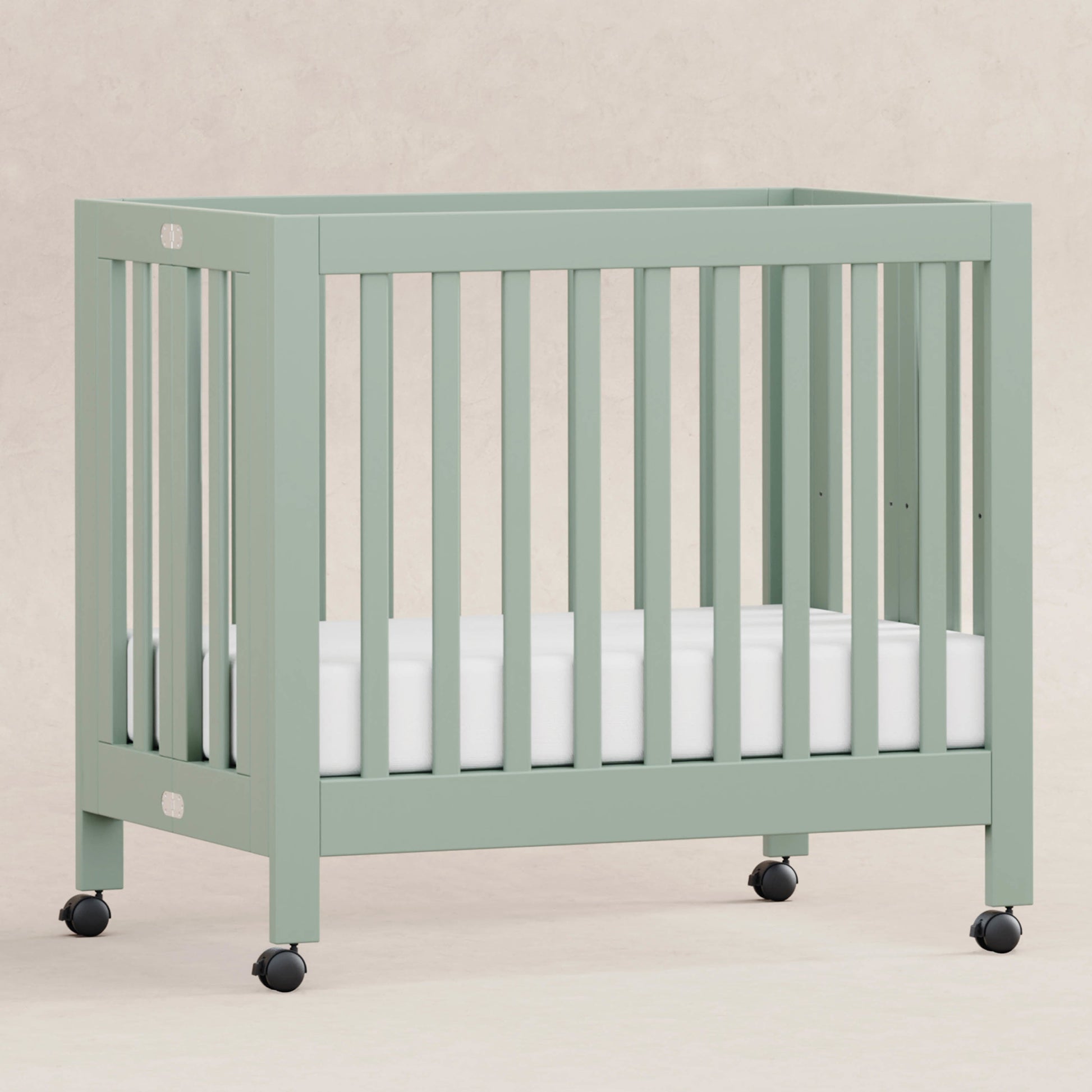 Babyletto Cribs Light Sage Babyletto Origami Mini Crib