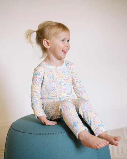 Uptown Baby Long Sleeve Romper - Multi-Colored Flowers