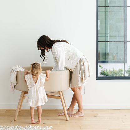 M26834GMLB,Babyletto,babyletto x GATHRE Capsule Bassinet in Millet