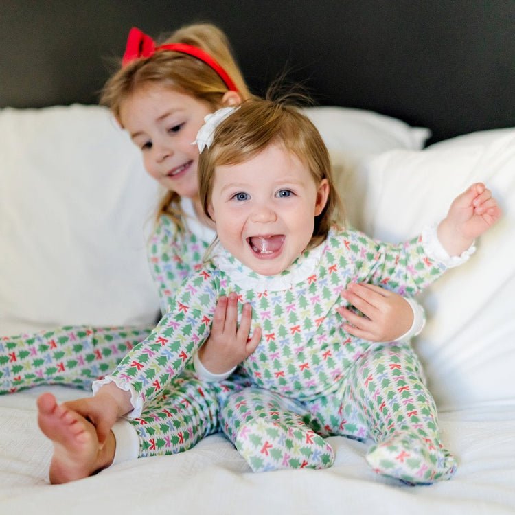 Lila and Hayes Lila and Hayes Girls Lucy Footed Romper - Tree Topper Bows