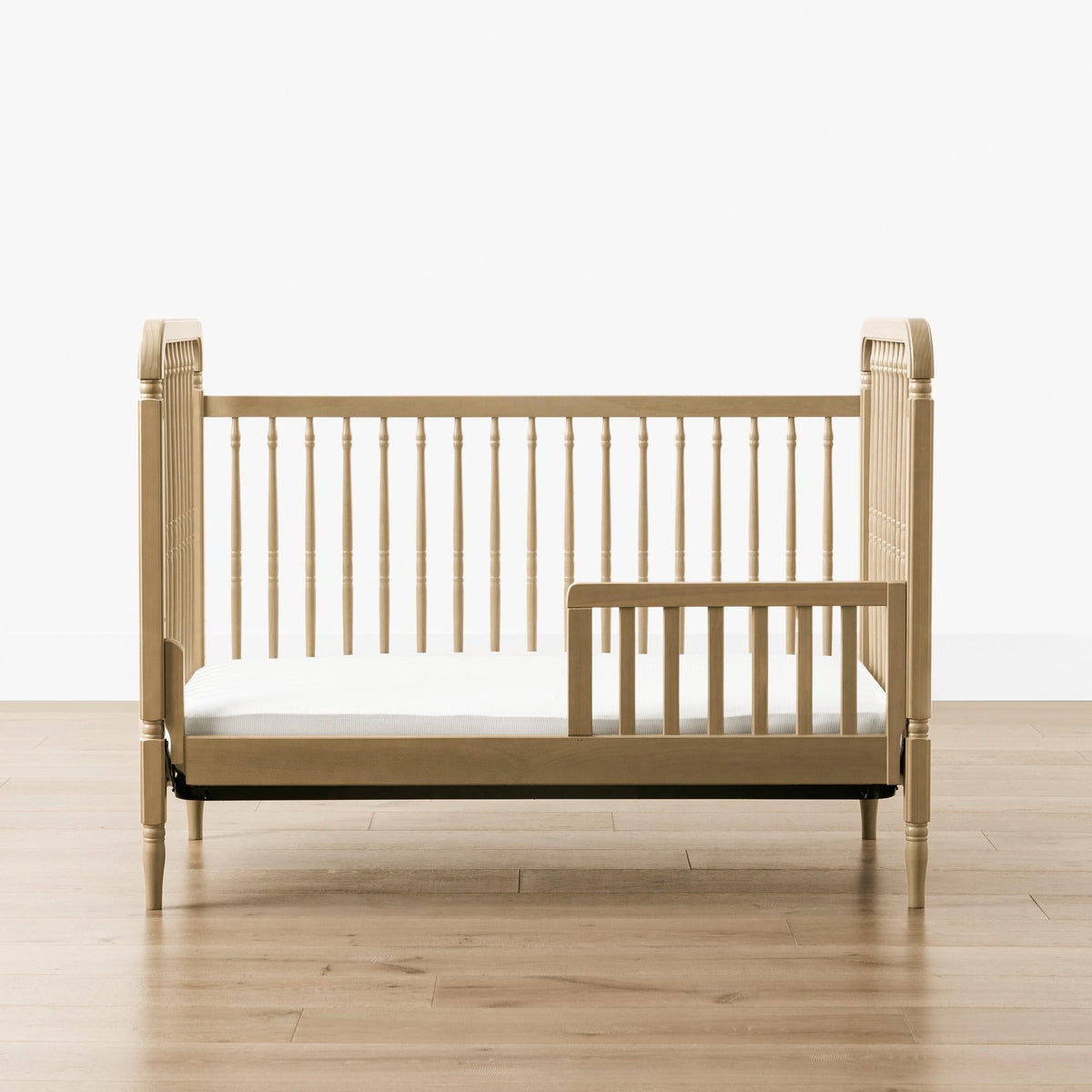 NamesakeNamesake Liberty 3-in-1 Convertible Spindle Crib with Toddler Bed Conversion KitBabysupermarket