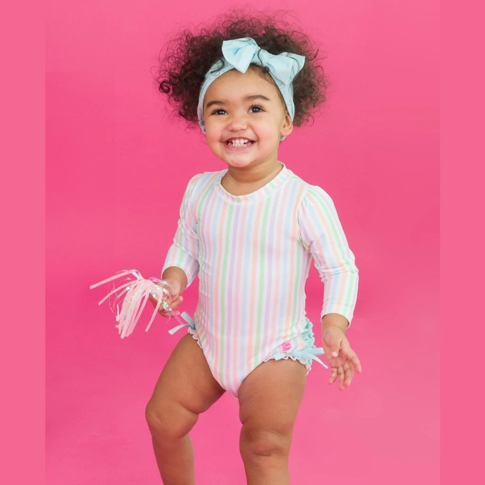 RuffleButts Pale Rainbow Stripe Long Sleeve One Piece Rash Guard Swimsuit