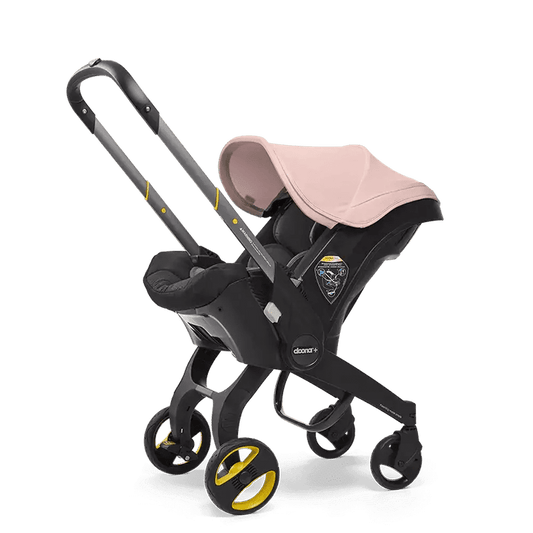 Doona Blush Pink Infant Car Seat/Stroller with Base